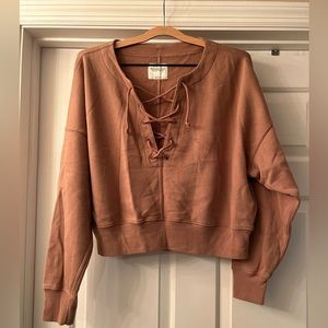 Crop sweatshirt with lace up front